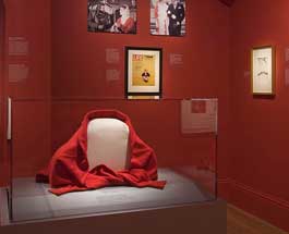 Photograph of Katharine Hepburn’s Brooks Brothers turtleneck sweater on display in the exhibition.