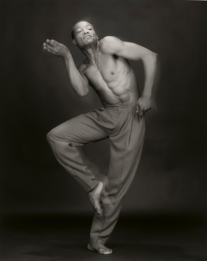 Black and white photograph of a man dancing 
