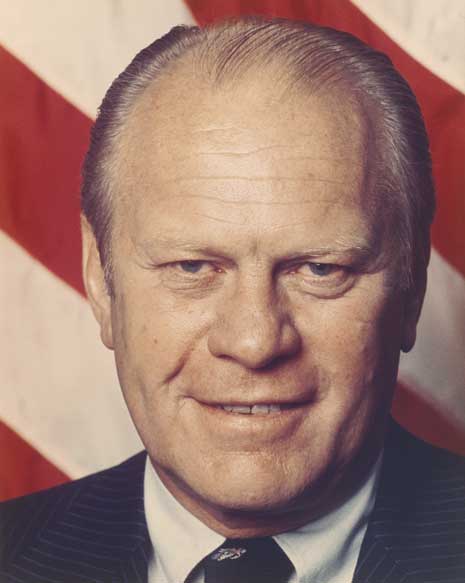 Photograph portrait of Gerald Ford, American flag in backjground