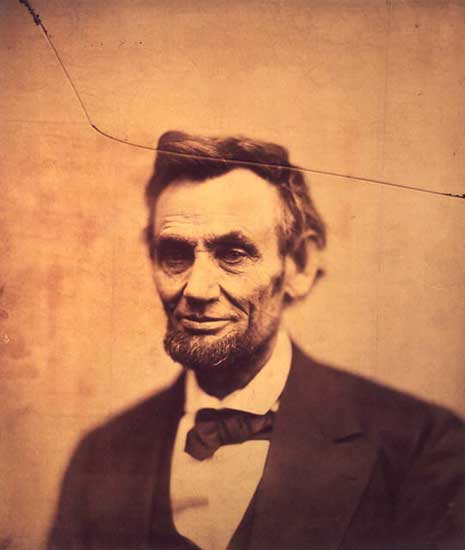 Photo portrait of Abraham Lincoln, with crack in upper part of photograph