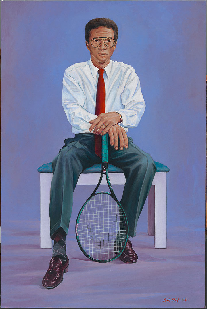 Seated man with a tennis racket