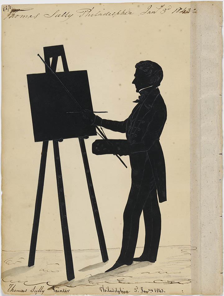 Silhouette of a man painting