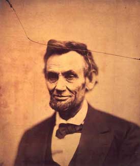 Photograph of Lincoln, crack running from top left corner and through Lincoln's hair
