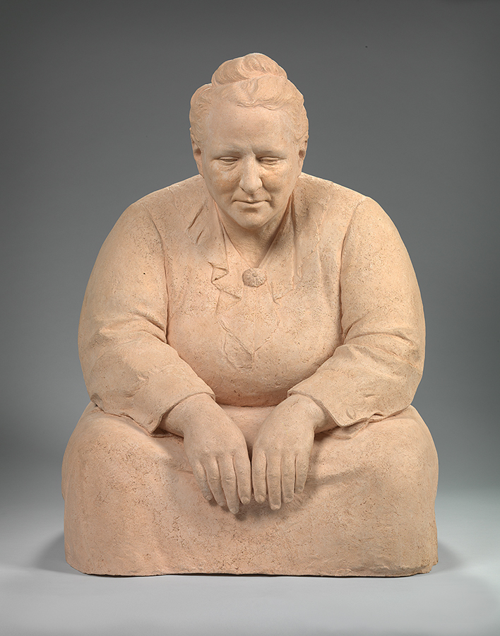 Sculpture of a seated woman