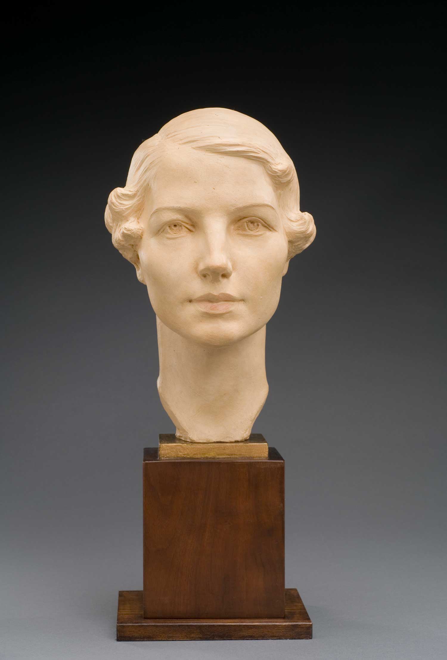 White sculpture of a woman's bust