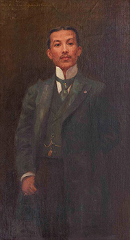 3/4 length portrait of a young man in a suit