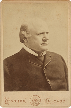 bust length carte de visit of a balding man in a suit