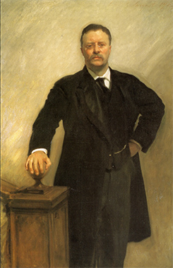 3/4 length portrait of a man in a black suit with a mustache 