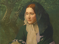 knee length view of a woman in green and black