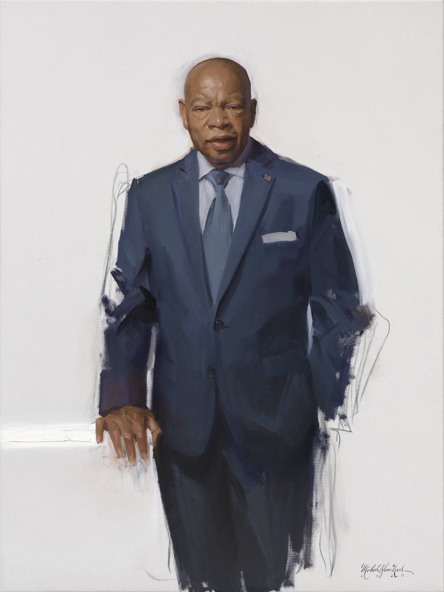 3/4 length portrait of a Black man in a blue suit