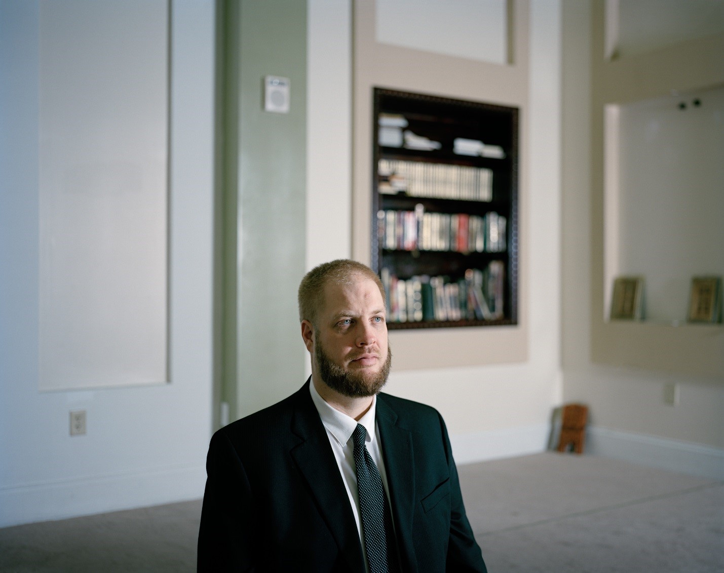 Bearded man in suit and tie