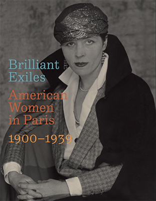 catalogue cover showing a waist length photo of a woman in a suit