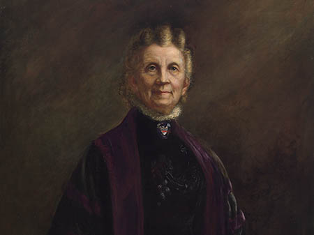 Older woman in a brown high-necked dress