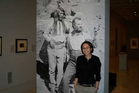 Maya Foo at entrance to "Faces of the Fronbtier" exhibition