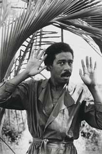 Blog_cosby_pryor2 Black and white photo of Richard Pryor, holding up his hands