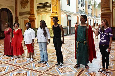 The cast of "Portraits Alive!" dressed in character