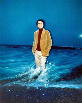 Blog_carl_sagan Photograph of Carl Sagan knee deep in water, with ocean waves in background