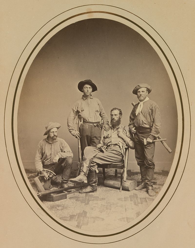 Sepia-toned photo of Clarence King and fellow explorers