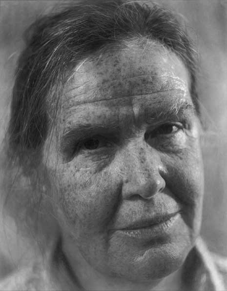 Black and white photo-realistic drawing of woman's face