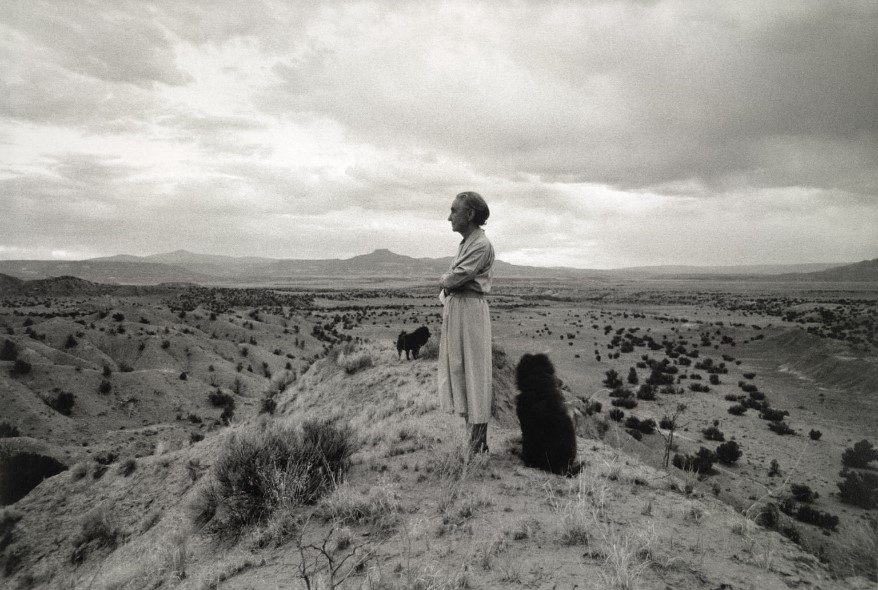 Georgia O'Keeffe and chows her dogs