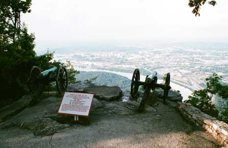 Daytime photograph from the top of Lookout Mountain with a Civil War-style cannon in the foreground