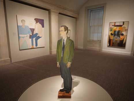 Color photo from inside the Face Value exhibition, showing various artworks.