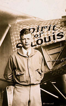 Charles Lindbergh next to his "Spirit of St. Louis" airplane