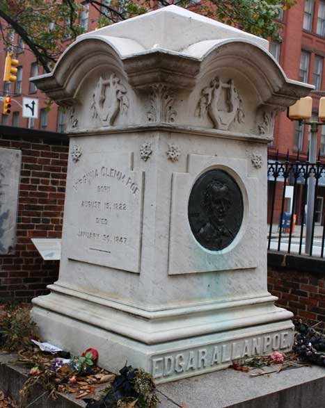 Large and ornate white gravestone 