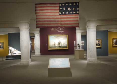 Entrance to the exhibition "1812: A Nation Emerges" with 17 star, 17 stripe flag