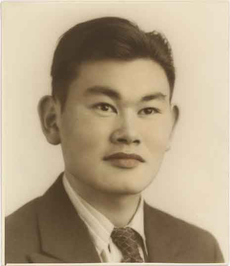 Colorized photograph portrait of Fred Korematsu in suit