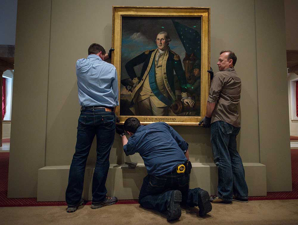 Installation of George Washington portrait