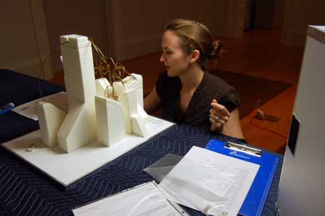 Jennifer Roberton working with a mounted sculpture