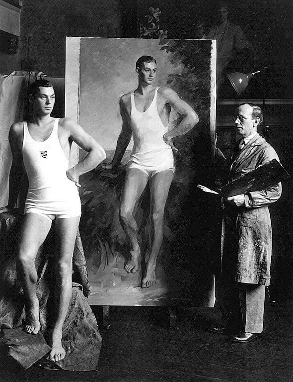 Black and white photo of Johnny Weissmuller posing fand having his portrait painted
