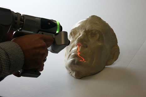 Lincoln life mask being 3d scanned with a handheld scanner