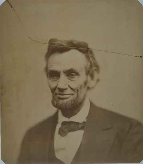 Blog_atlantic_lincoln Photograph of Lincoln -- the photo is cracked, with thin crack from left corner through top of Lincoln's head