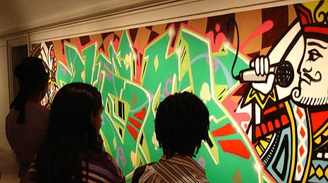 Visitors looking at "RECOGNIZE!" exhibition