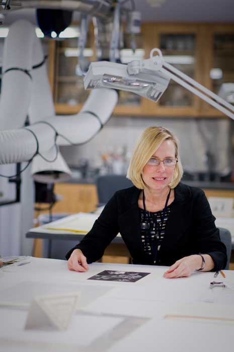 Rosemary Fallon at work in the museum's Conservation Lab