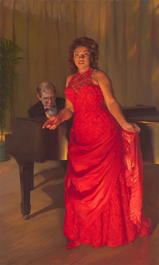 woman in a red gown standing before a piano, singing