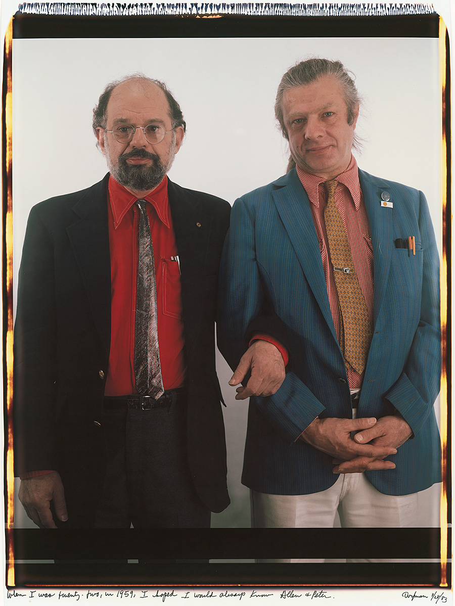 two middle-aged men standing arm-in-arm
