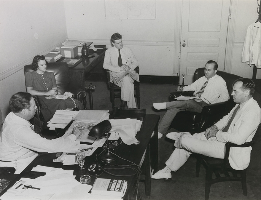 People seated around a conference table