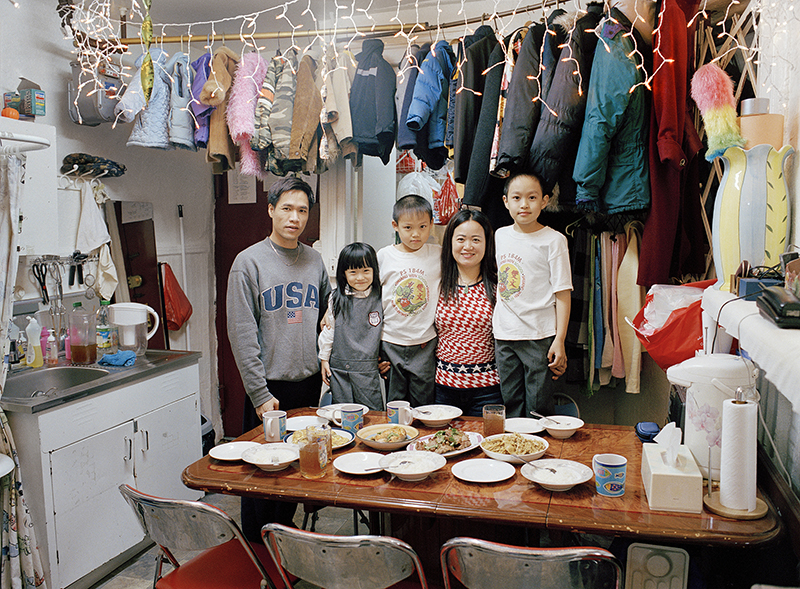 Portrait of a Chinese family in a cramped apartment