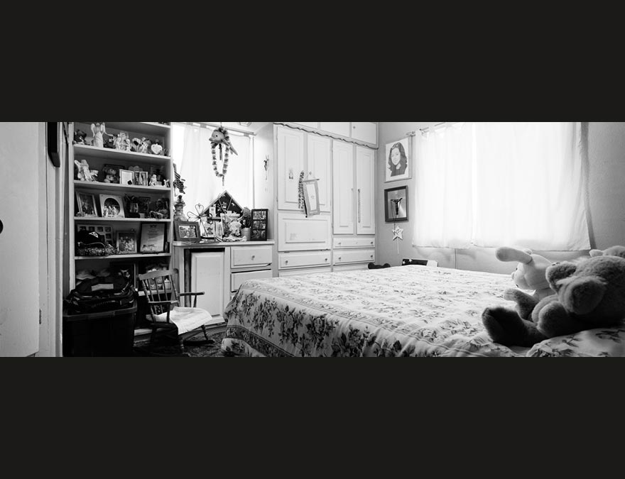 Black and white photo of a soldier's bedroom back home