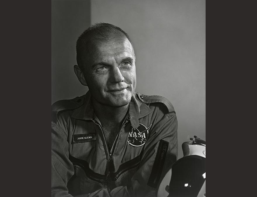 Black and white photo of a man in a flight suit