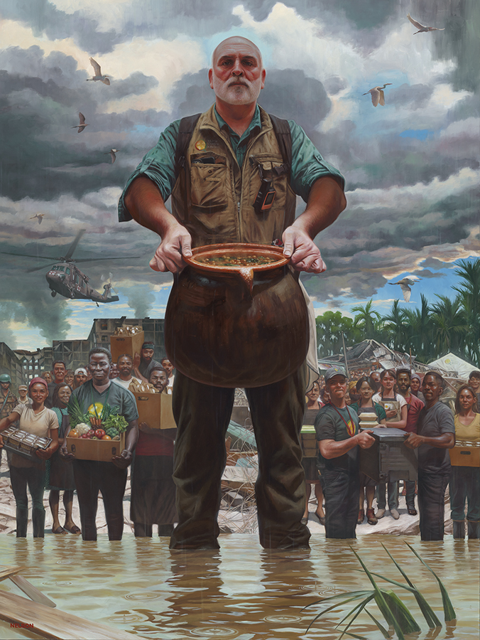 man standing in a flooded area holding a cauldron of food