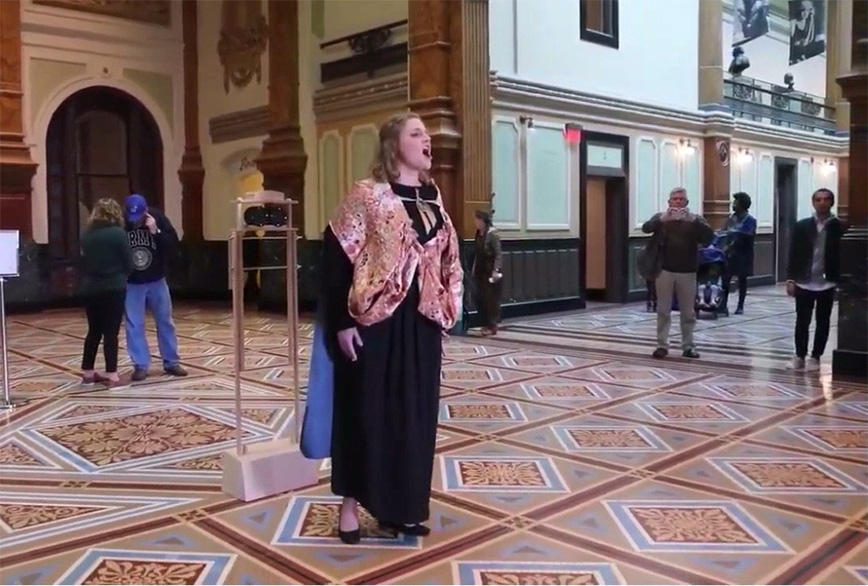 woman singing in the Great Hall