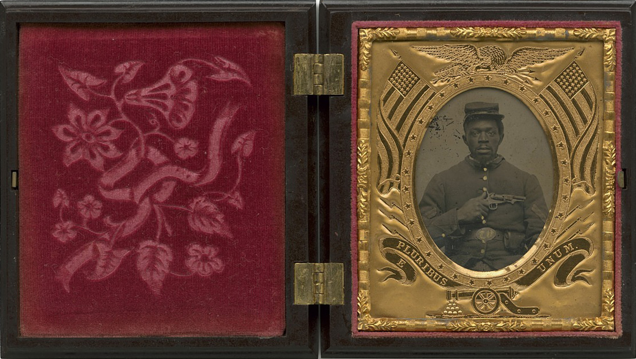 tintype photo of a Black Civil War soldier in a gold and velvet frame