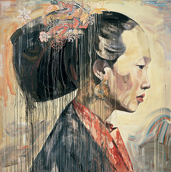 Profile portrait of a young Asian woman with her hair up