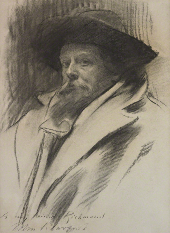 bearded man in a coat