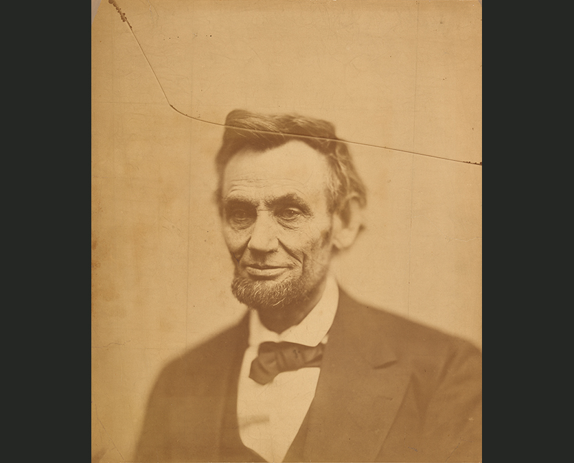 Photograph of Abraham Lincoln in a dark suit