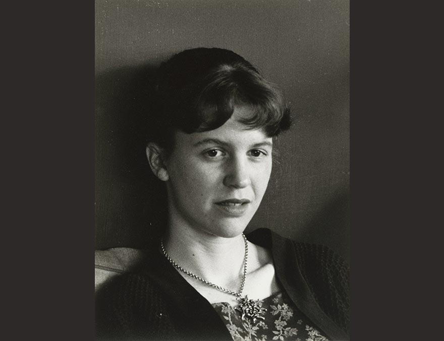 Photo of a woman with dark hair and bangs